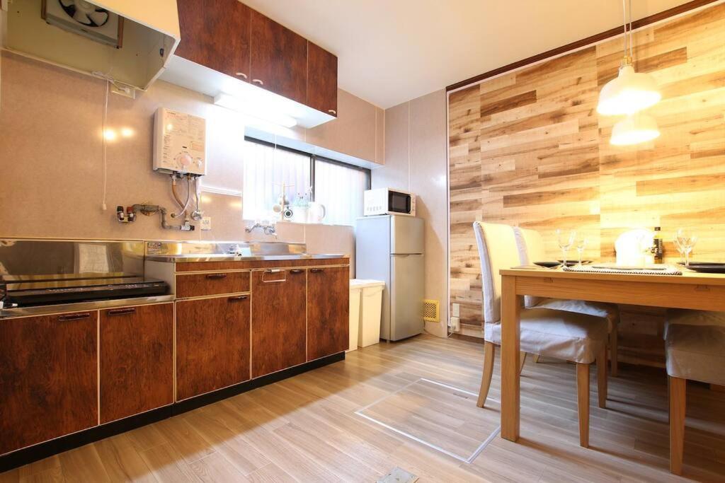 Apartamento ｕｓｊ,万博,梅田への交通抜群,ファミリーで安心のguesthouse-泉- *
