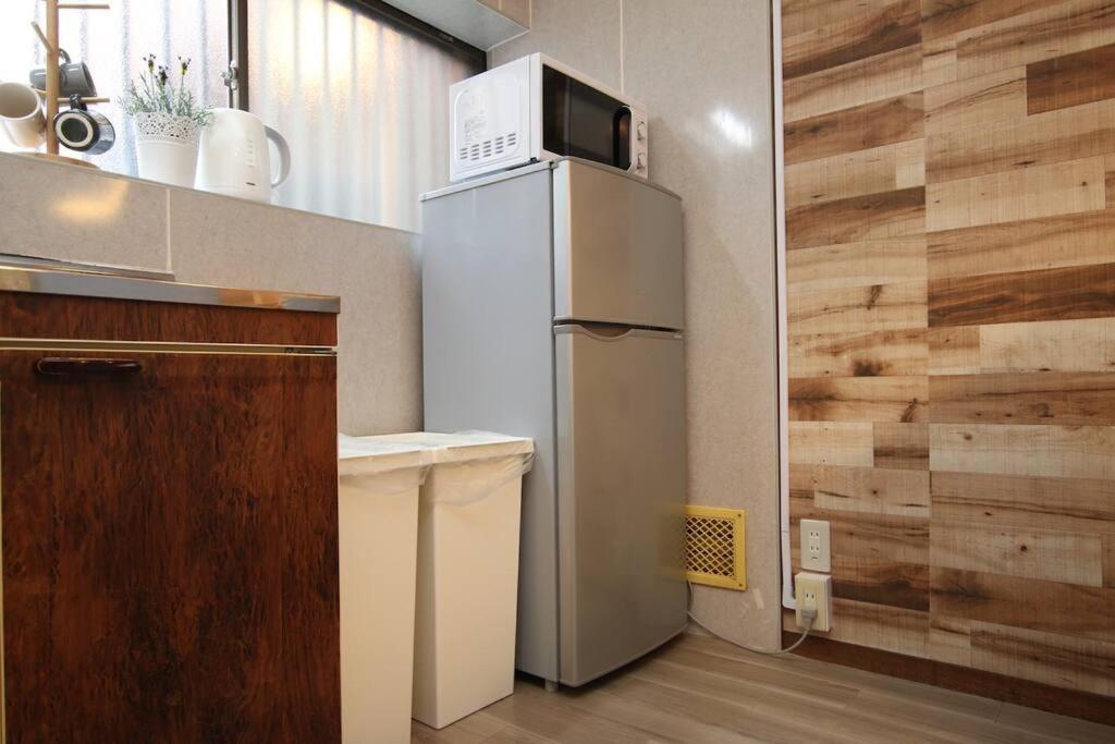 ｕｓｊ,万博,梅田への交通抜群,ファミリーで安心のguesthouse-泉- Apartamento *