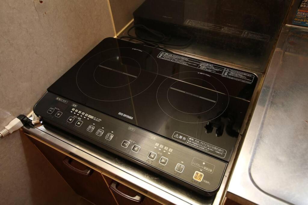 Apartamento ｕｓｊ,万博,梅田への交通抜群,ファミリーで安心のguesthouse-泉- Osaka