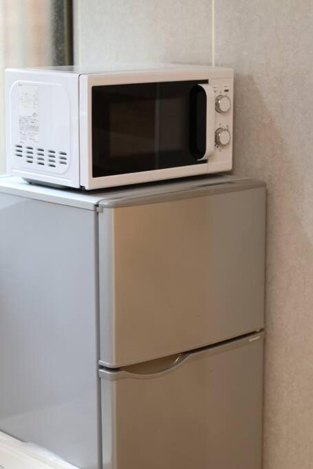 ｕｓｊ,万博,梅田への交通抜群,ファミリーで安心のguesthouse-泉- Apartamento Osaka